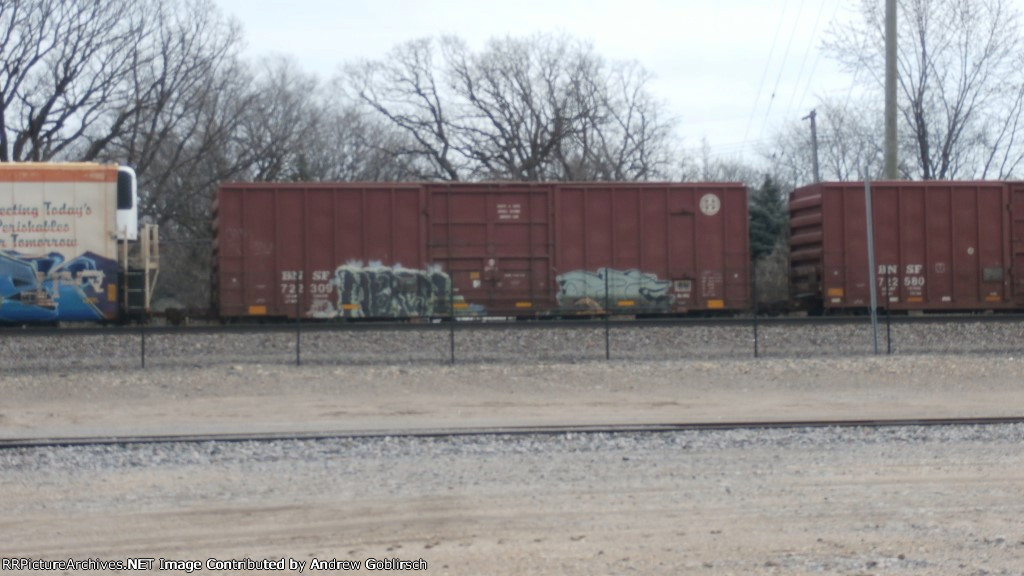 BNSF 722309 passes station